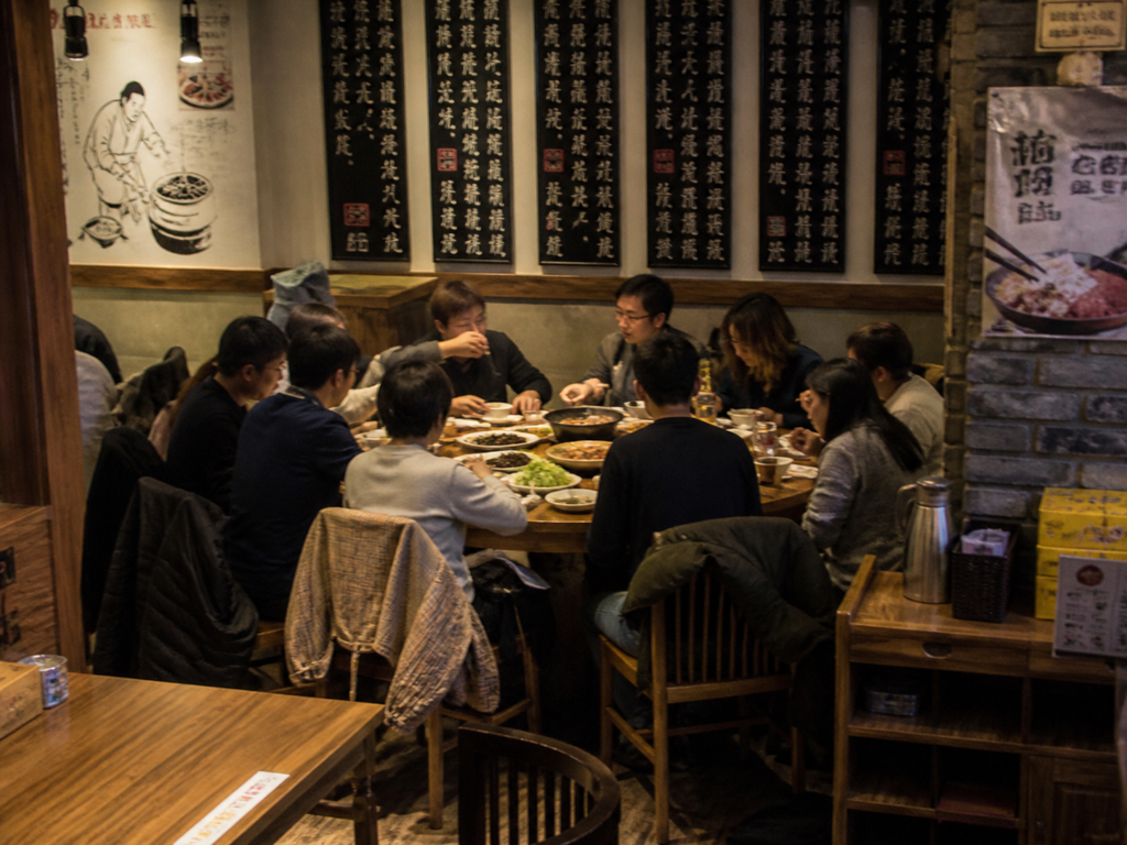 people are enjoying meal at silk road restaurant